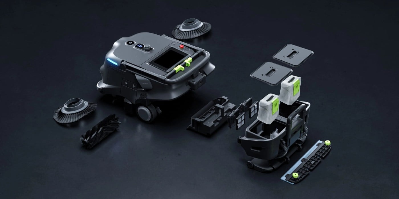 Disassembled view of PUDU MT1 VAC robot with brushes, side cover, filter, battery packs, and mop tray