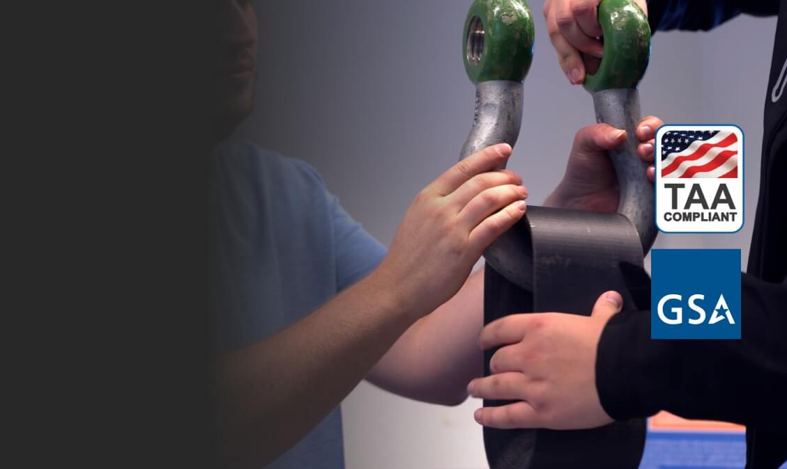 Графіка, що підкреслює відповідність TAA та європейське походження UltiMaker S8 Secure для урядового використання.